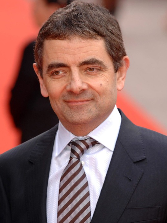 rowan atkinson canned laughter